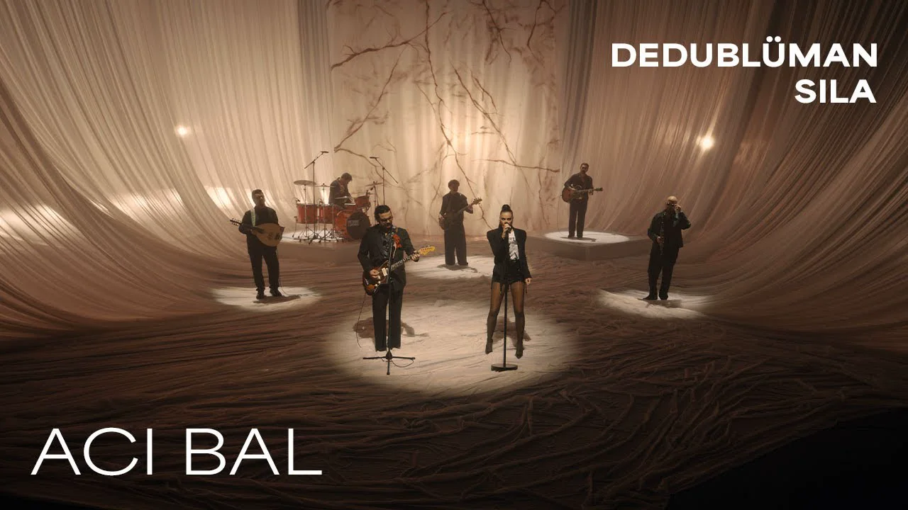 Dedublüman Sinop Konseri — 2026-07-30 kartında kullanılan, resmî Dedublüman YouTube videosundan alınmış tanıtım karesi; konser afişi değildir. · Dedublüman